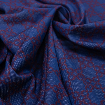 Трикотаж жаккардовый синий с красными узорами